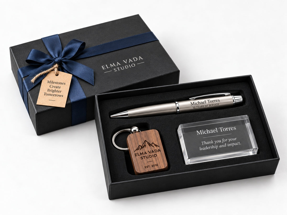 Premium employee milestone gift set with an engraved pen, wooden keychain and personalized clear recognition piece in a presentation box.