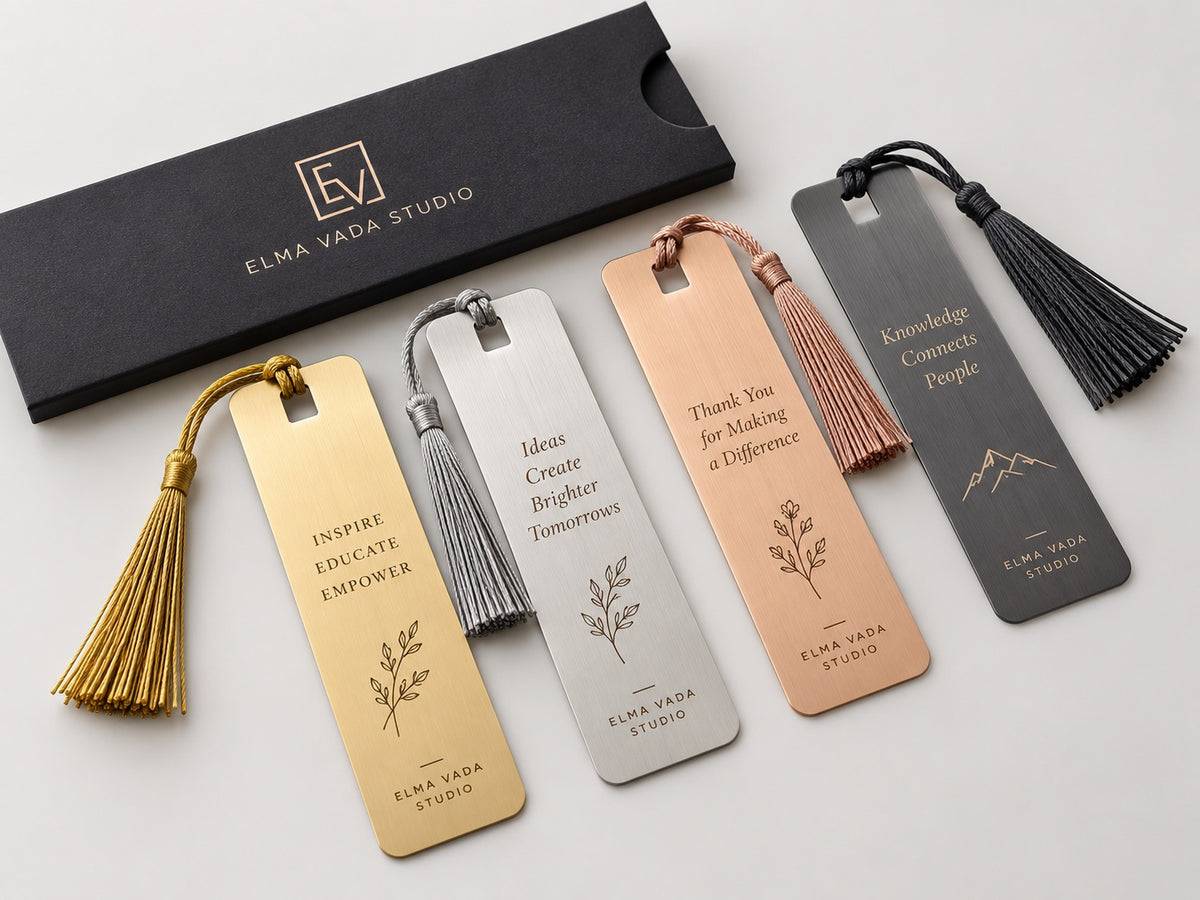Set of engraved metal bookmarks in gold, silver, rose and dark finishes with tassels and appreciation messages for event speakers.
