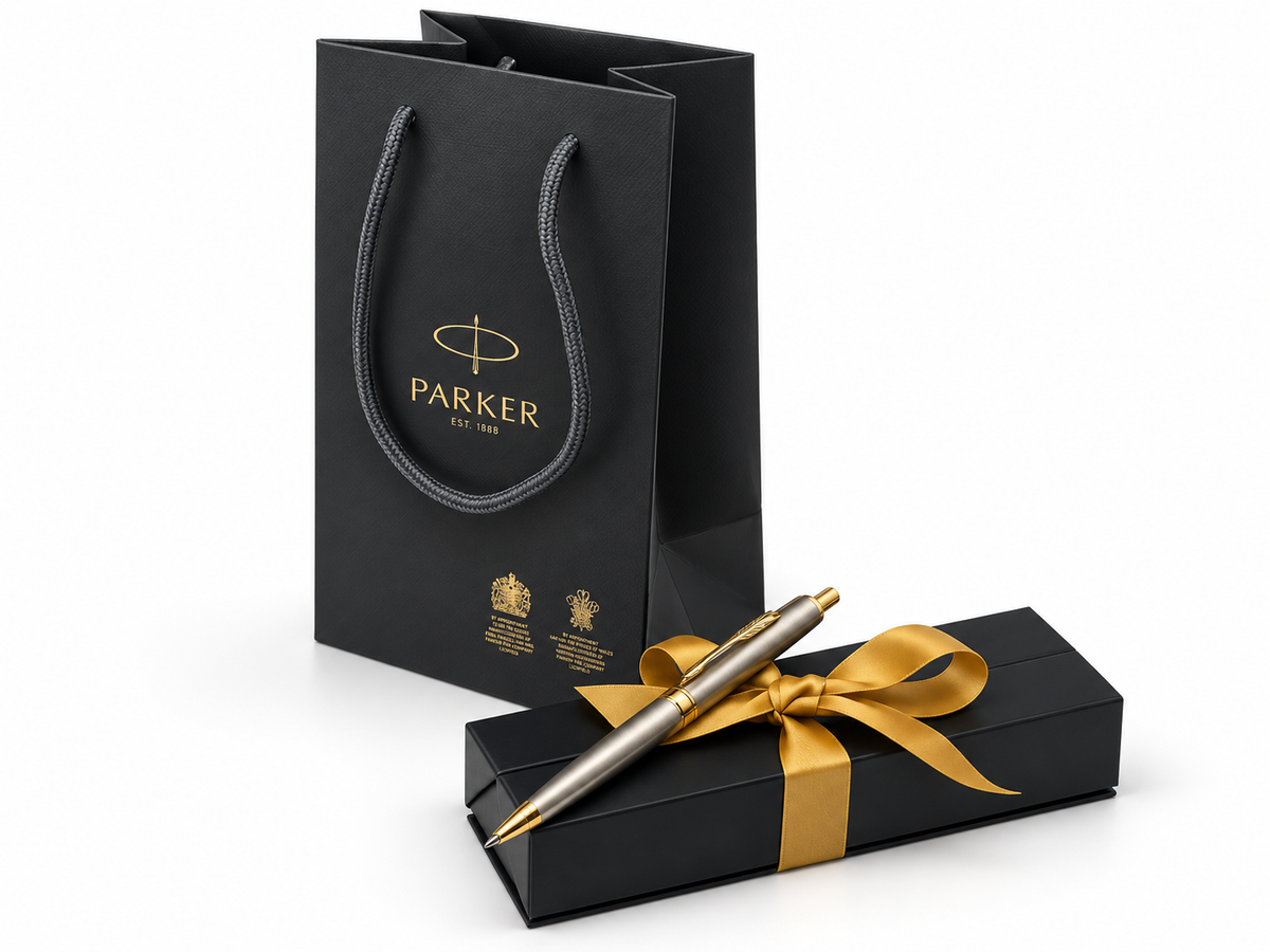 Gift-ready presentation with engraved Parker pen, gold ribbon, and black gift bag, Elma Vada corporate gifting